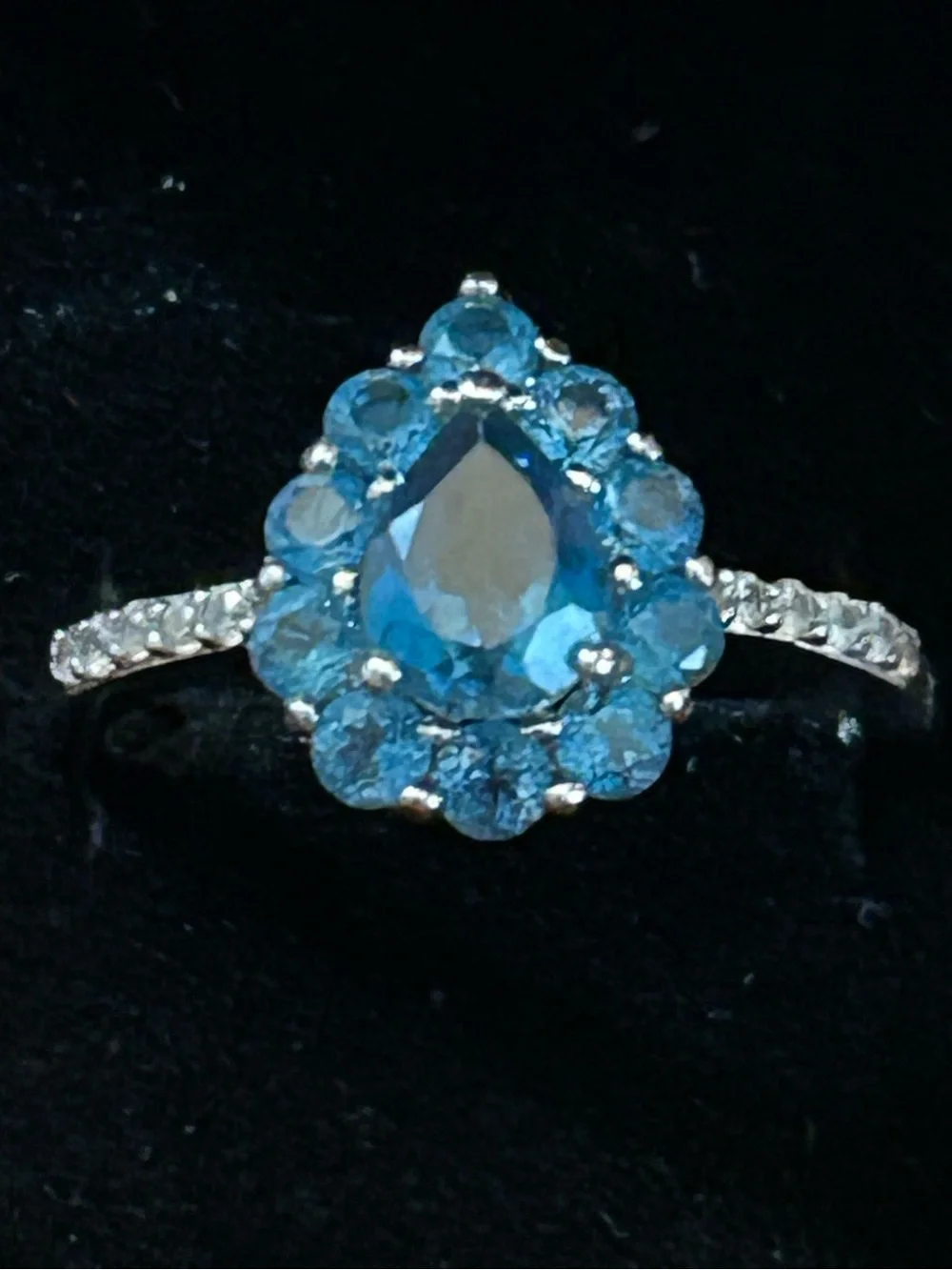 .94CT Pear Shape & 1.28CTW Round London Blue Topaz w/.18CTW White Zircon Ring